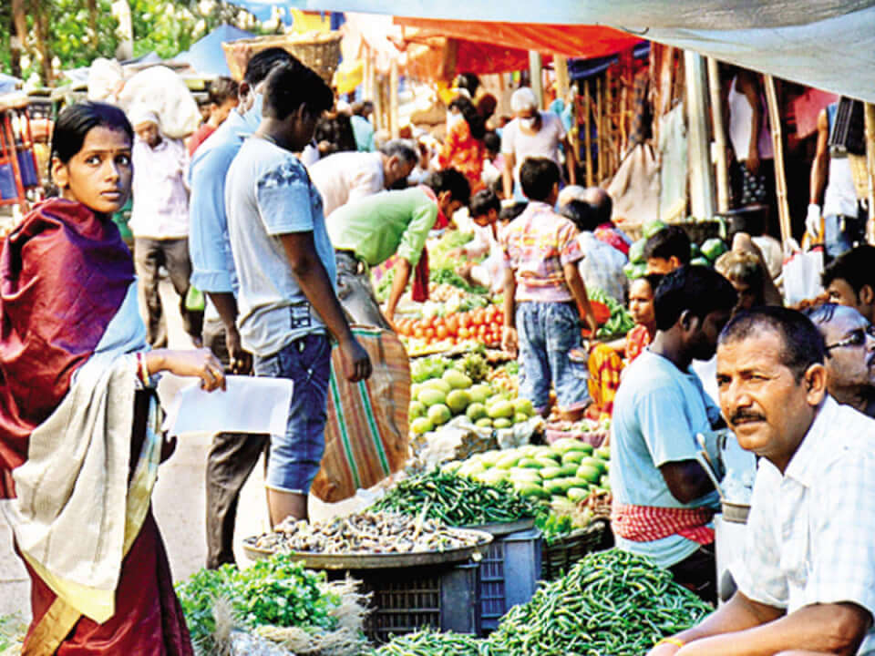 People at Anta Ghat vegetable market in Patna on Monday